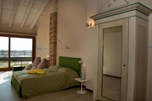 Postel nebo postele na pokoji v ubytování Agriturismo La Barena
