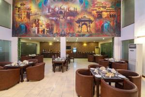 En restaurang eller annat matställe på Hotel One The Mall, Lahore