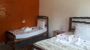 Katil atau katil-katil dalam bilik di Carpe Diem Nungwi