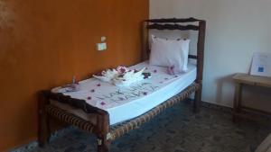 Een bed of bedden in een kamer bij Carpe Diem Nungwi