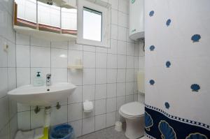 Koupelna v ubytování Apartments Boza