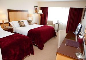 Katil atau katil-katil dalam bilik di Headfort Arms Hotel