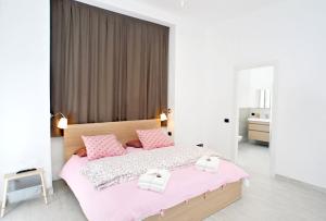 A bed or beds in a room at Guest House La Genesa