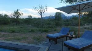 Photo de la galerie de l'établissement Hidden 2-Bedroom Gem In A Quiet Wildlife Estate, à Hoedspruit