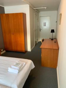 Postel nebo postele na pokoji v ubytování Narvik Budget Rooms