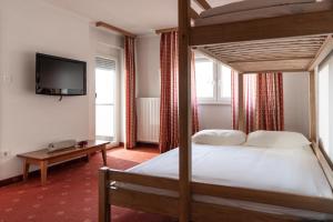Кровать или кровати в номере Hotel Medno