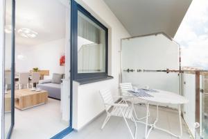 Balkón alebo terasa v ubytovaní Jantar Apartamenty Bliżej Morza