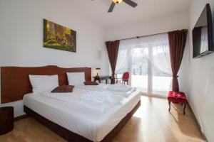 Ένα ή περισσότερα κρεβάτια σε δωμάτιο στο Dwór i Dworek Leszczowate Wellness & Spa