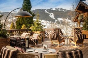 Ресторант или друго място за хранене в Les Chalets du Mont d'Arbois Megeve, a Four Seasons Hotel