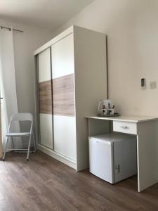 Кухня или мини-кухня в Apartment & Rooms Riva
