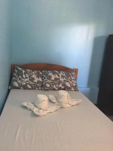 Postel nebo postele na pokoji v ubytování Panglao Rainbow Inn