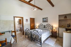 Postel nebo postele na pokoji v ubytování Truddhi Casa e Cucina di Puglia