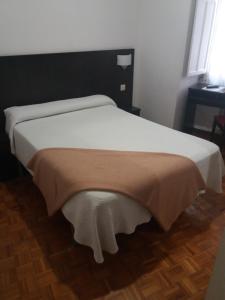 Cama o camas de una habitación en Hotel Irixo