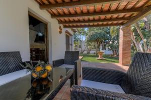 Posedenie v ubytovaní Hacienda Roche Viejo