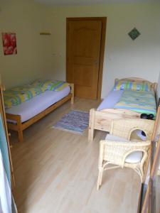 Ein Bett oder Betten in einem Zimmer der Unterkunft Appartementhaus Angelika