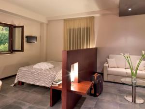 Voodi või voodid majutusasutuse Il Castagneto Hotel toas