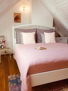 Postel nebo postele na pokoji v ubytování Appartements des Merveilles