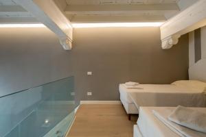 Bazén v ubytovaní Casa Velluti Deluxe by Mmega alebo v jeho blízkosti