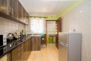 Kjøkken eller kjøkkenkrok på Esterina Suites