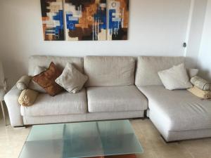 A seating area at First Line Cabo Roig Orihuela Costa