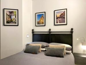 Postel nebo postele na pokoji v ubytování Venice Boutique House