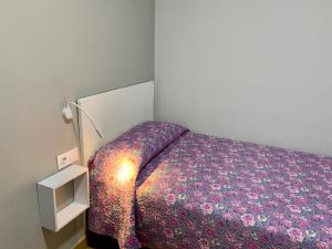 Ein Bett oder Betten in einem Zimmer der Unterkunft Apartamentos Maladeta
