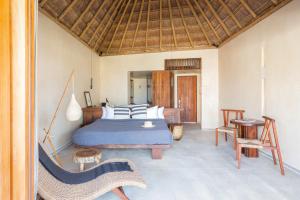 Postel nebo postele na pokoji v ubytování Hotel Ma'xanab Tulum