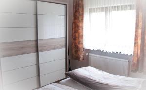 Postel nebo postele na pokoji v ubytování Landhaus Maria