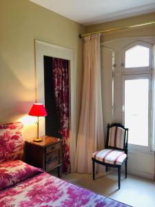 Letto o letti in una camera di Château Maucaillou