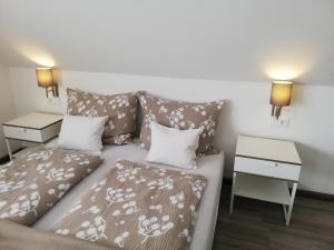 Postel nebo postele na pokoji v ubytování Éva Apartman