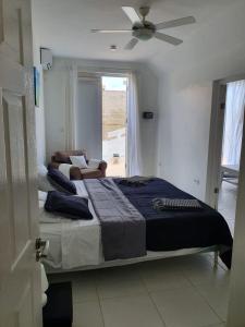 Postel nebo postele na pokoji v ubytování A1 APARTMENT budget at JAN THIEL Curacao
