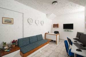 Castello Apartments tesisinde bir televizyon ve/veya eğlence merkezi