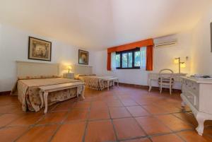 Posteľ alebo postele v izbe v ubytovaní Hacienda Roche Viejo