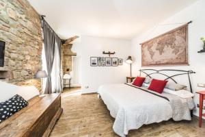 Katil atau katil-katil dalam bilik di B&B Grano e Lavanda