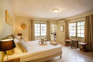 Postel nebo postele na pokoji v ubytování B&B Sombre di Kabana + 37 fotografií