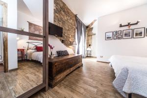Postel nebo postele na pokoji v ubytování B&B Grano e Lavanda