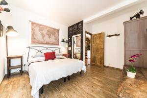 Postel nebo postele na pokoji v ubytování B&B Grano e Lavanda