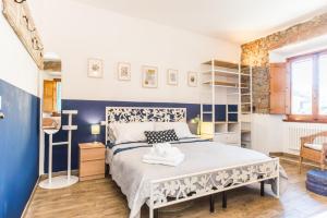 Postel nebo postele na pokoji v ubytování B&B Grano e Lavanda