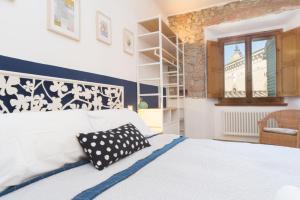 Postel nebo postele na pokoji v ubytování B&B Grano e Lavanda