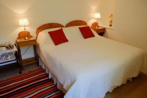 En eller flere senge i et værelse på Bagnell Farm Cottage