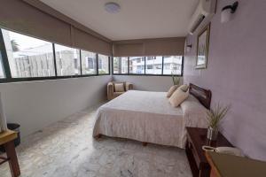 מיטה או מיטות בחדר ב-Hotel Plaza
