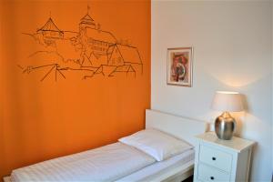 Tempat tidur dalam kamar di Economy Hotel Kronach