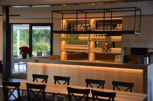 Lounge nebo bar v ubytování B&B Tantine