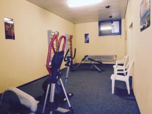 a gym with some exercise equipment in a room at Ferienwohnung 424 mit Hallenbad in Bad Reichenhall