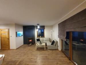 Część wypoczynkowa w obiekcie Apartamenty i Domki Mierzeja