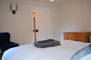 Letto o letti in una camera di Alpine Haus
