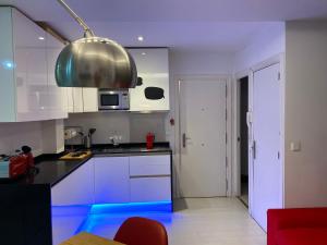 A kitchen or kitchenette at CAMILA, en CHUECA