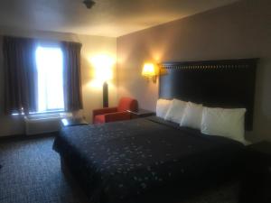 Postel nebo postele na pokoji v ubytování Pier Inn