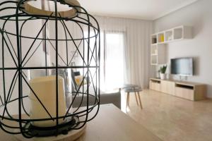 TV a/nebo společenská místnost v ubytování COSTA MARINA - Cabo Roig - Vista a piscina