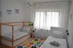 Krevet ili kreveti u jedinici u objektu Apartman 19:14